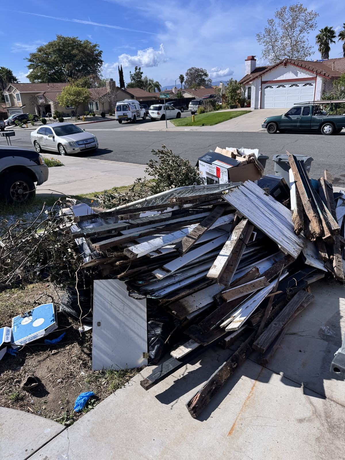 Full-service junk removal in Temecula Valley — Junk Corral loading a mixed pile